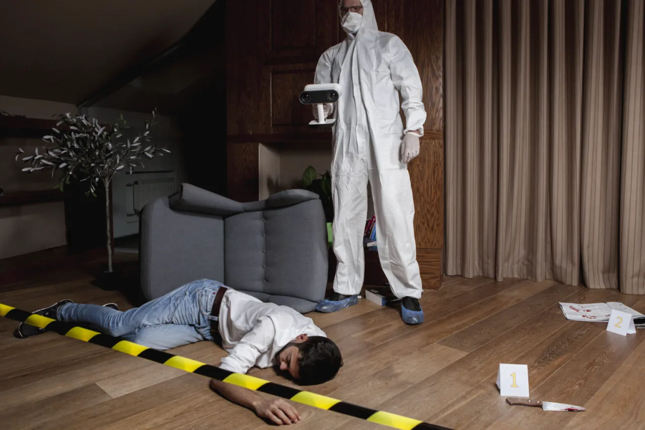Artec Leo handheld 3D scanner documenting a staged indoor crime scene