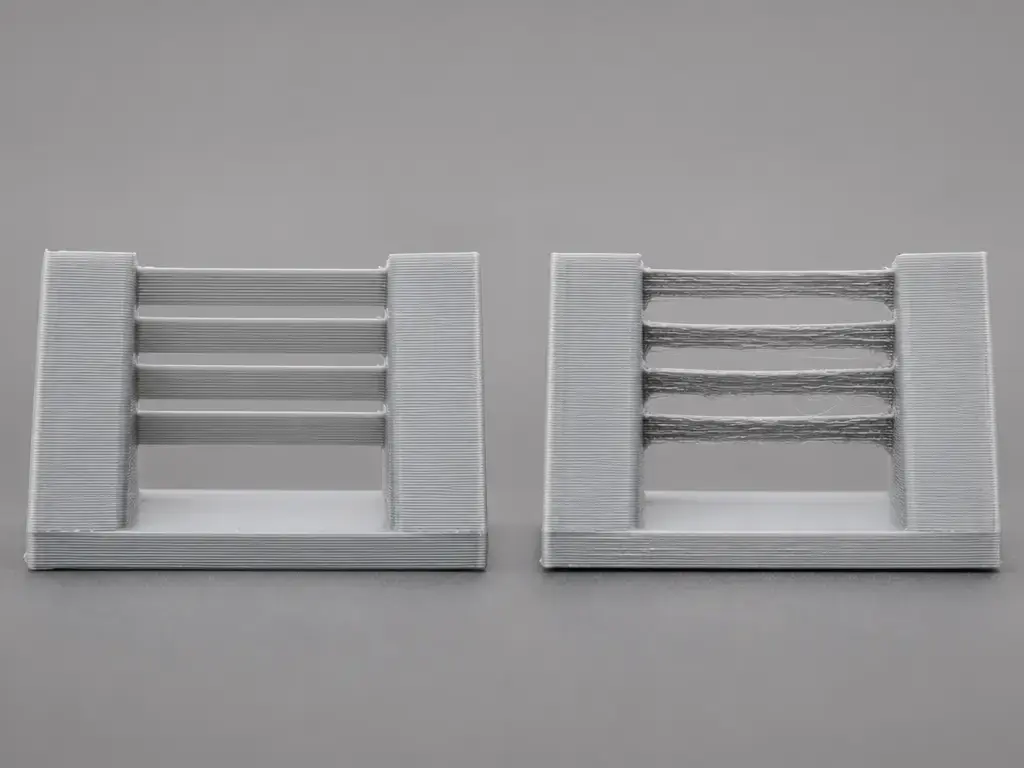 PLA and PETG bridge test undersides compared for sagging and stringing