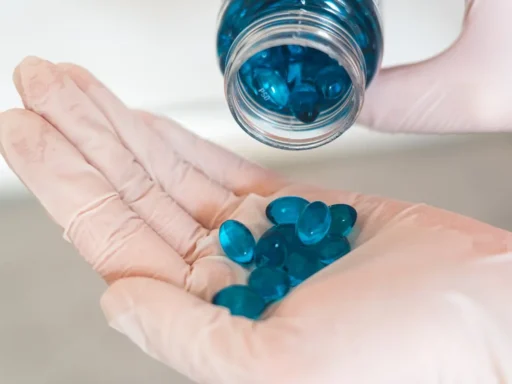 Blue Medication Pill on Persons Hand